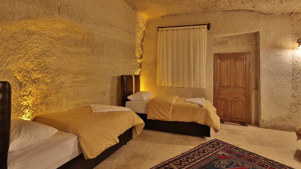 Garden Cave Hotel Гьореме Стая снимка