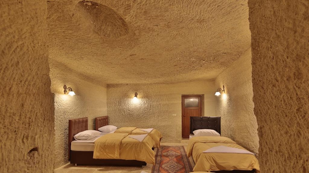 Garden Cave Hotel Гьореме Стая снимка