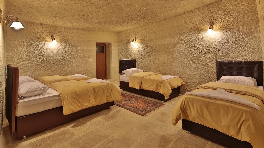 Garden Cave Hotel Гьореме Стая снимка